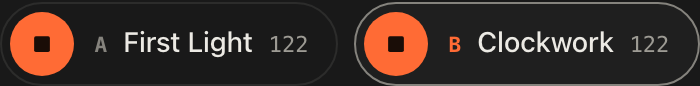 The top bar with deck A and deck B both loaded, their titles and tempos showing, and deck A in focus